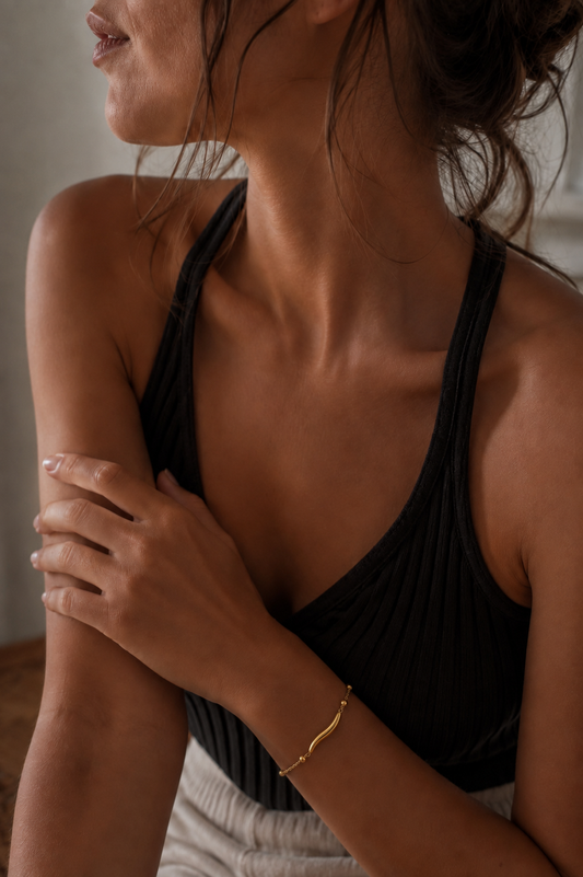 Hot Girl Summer Bracelet, close-up detail shot, 18k gold-plated waterproof bracelet by Golden Hour — delicate chain with a polished chilli pepper charm